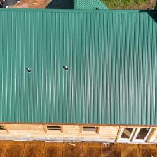 Green-Metal-Roofing-Enhancing-Rustic-Charm-in-Rogersville-TN 1